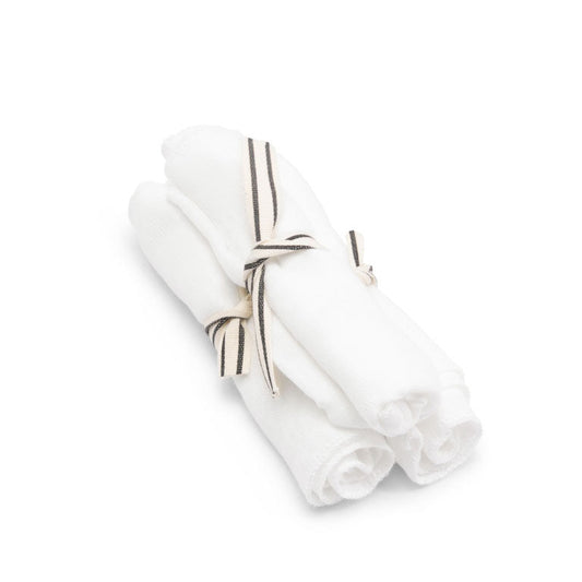 three facial shammys tied up on a white background